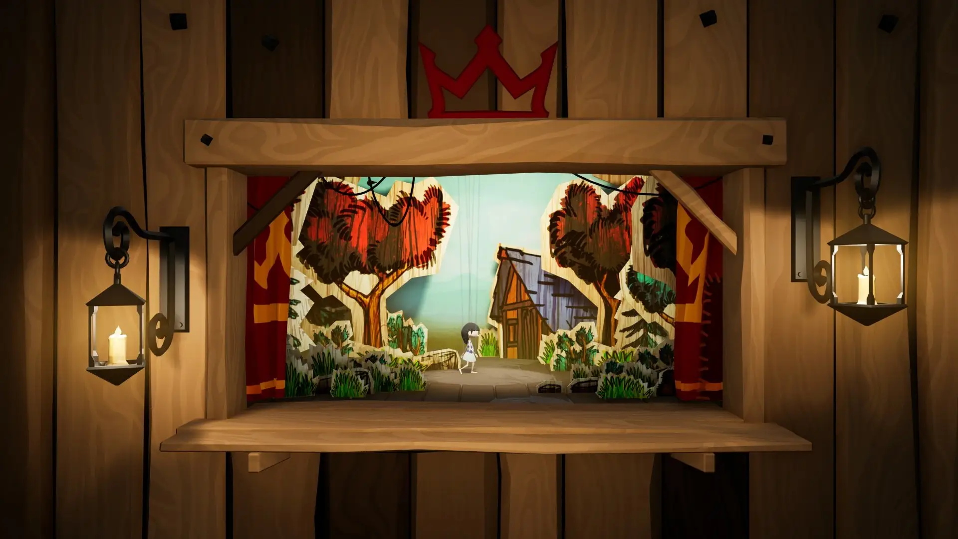A miniature puppet theatre with red curtains, lit by two lanterns