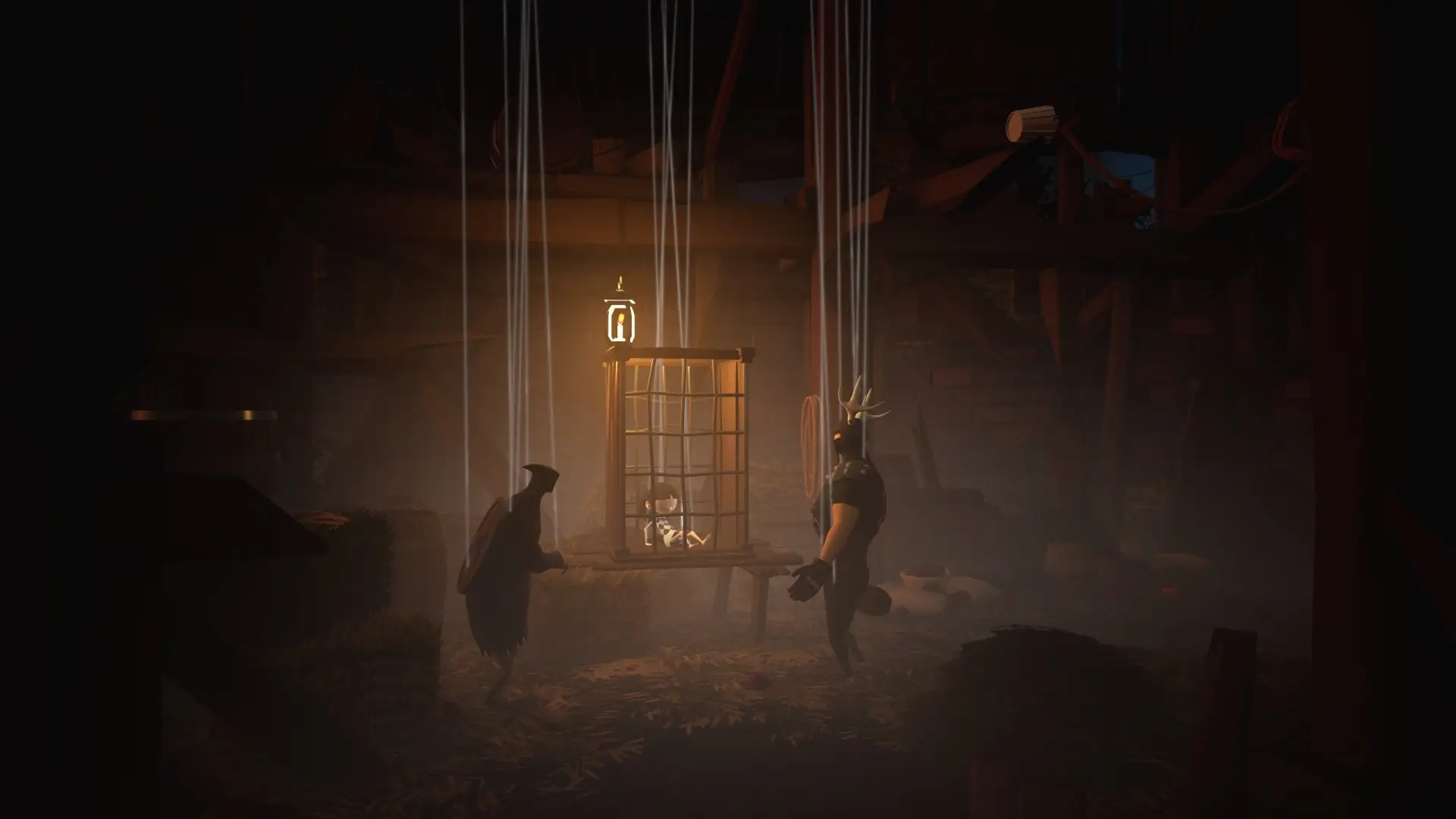 Puppets in silhouette around a caged lantern in a dim workshop