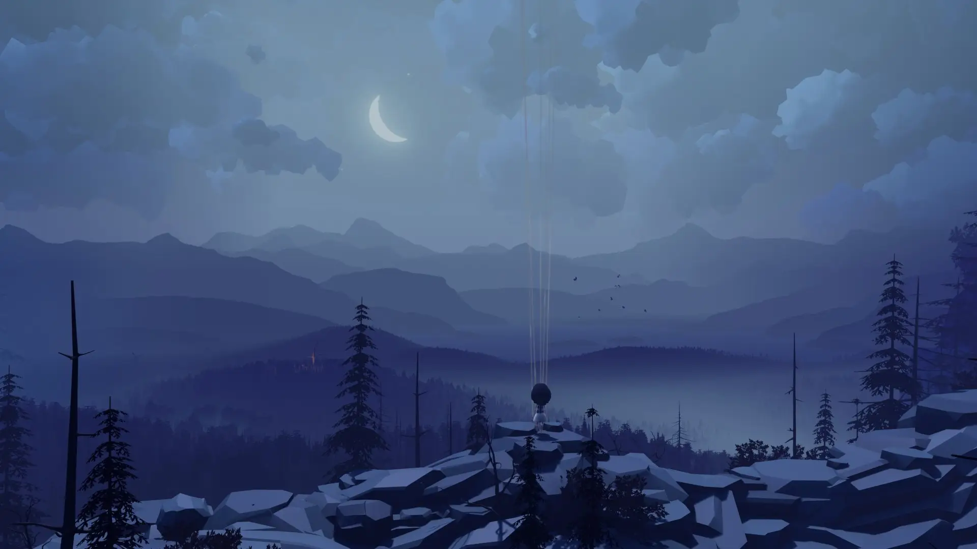 Abby on a snowy ridge under a crescent moon, mountains behind